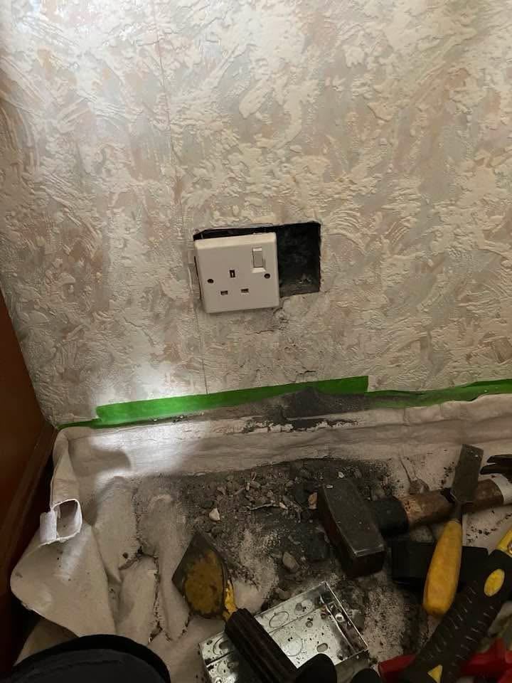 Socket work in progress with tools and dust sheet